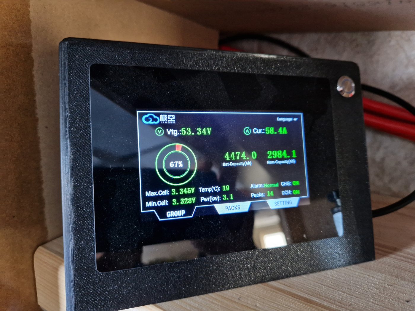 Large LCD touch display in a box with a battery overview