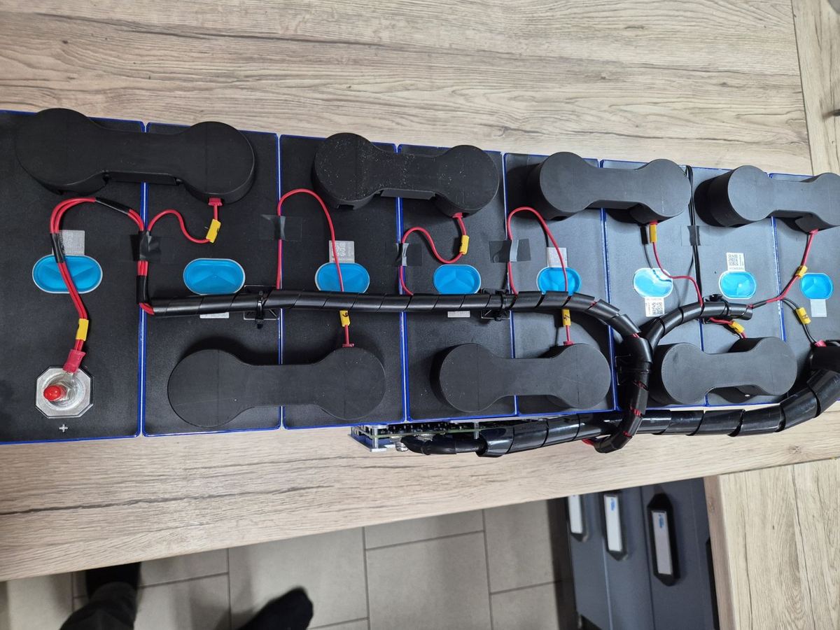 Connected cells with protective covers and wiring